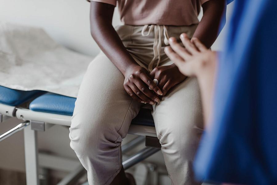 Women sits in doctors office