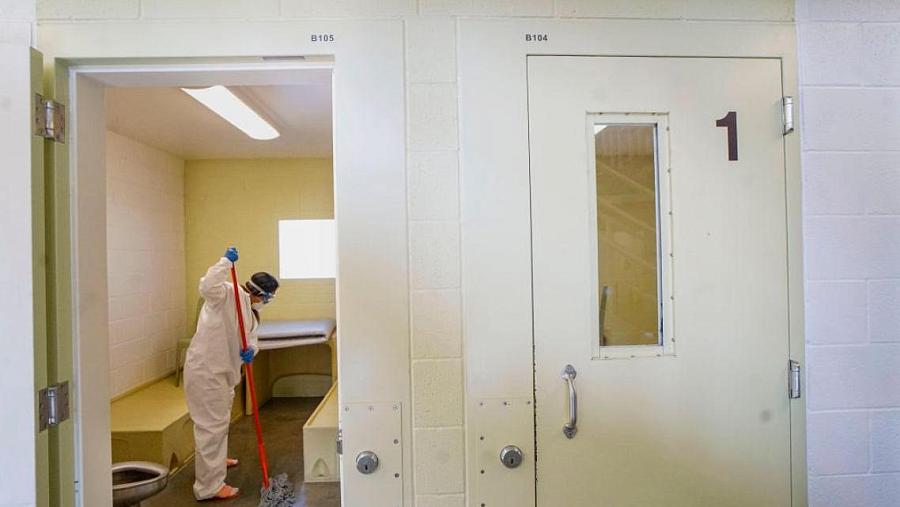 An inmate cleans a jail cell at the Las Colinas Women’s Detention Facility in Santee, California, in April 2020.