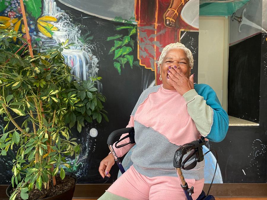 Vicky Blake of San Francisco laughs in her senior living home during an interview. Blake has been a medical marijuana card holder since the 90s, when she was diagnosed with HIV. | Natalie Fertig/POLITICO
