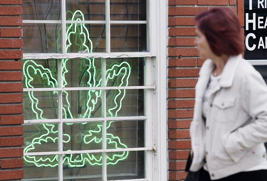 Many people who have medical marijuana licenses have to improvise their own solution in the ever-widening gap between state and federal cannabis laws. | Richard Vogel/AP Photo