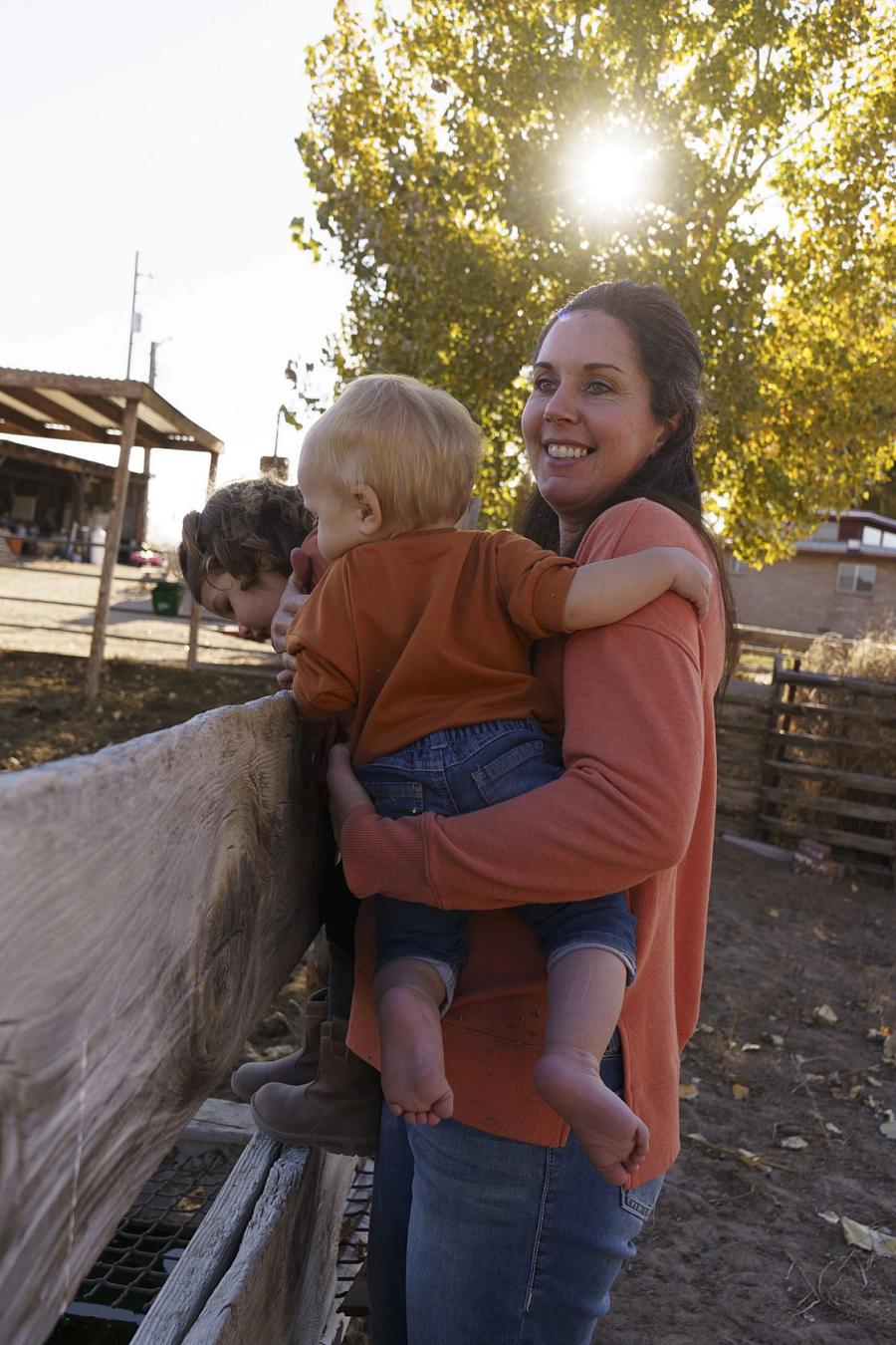 Image of a person holding a child