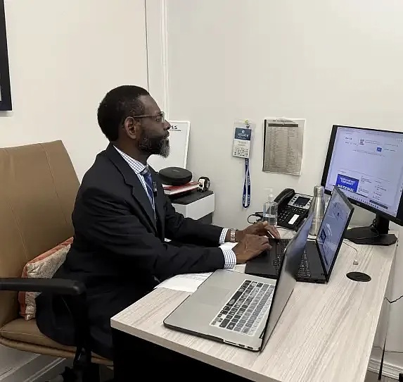A men working on a desk 
