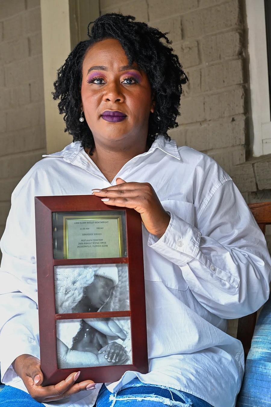 Person holding photo frame