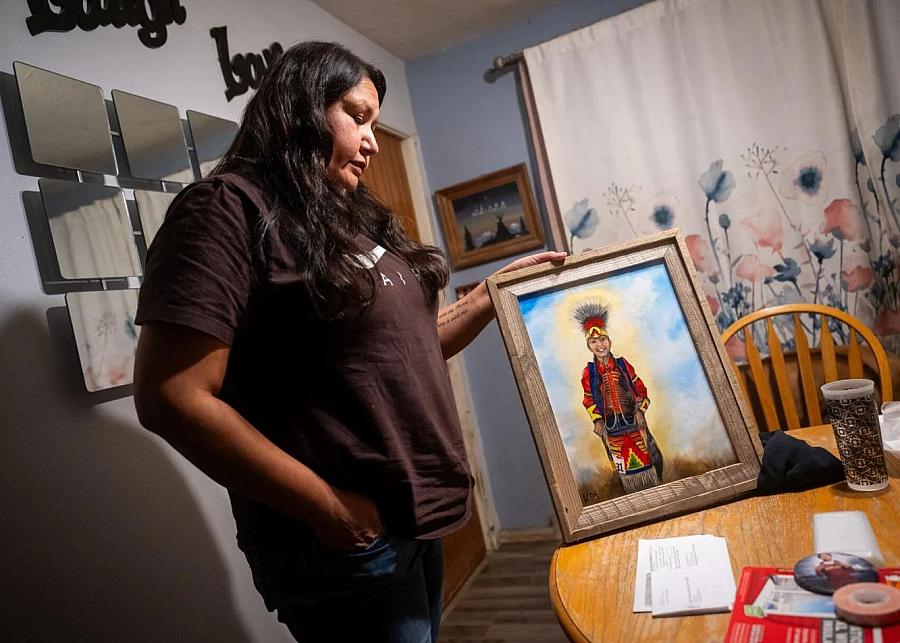 Person holding photo frame