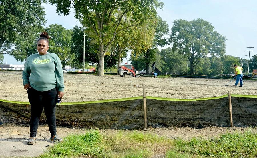 person standing in front of empty land