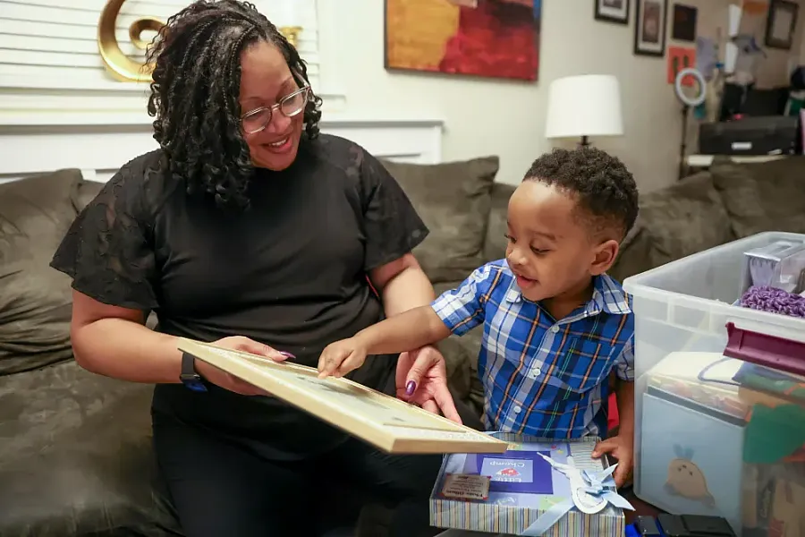 Person tutoring a child