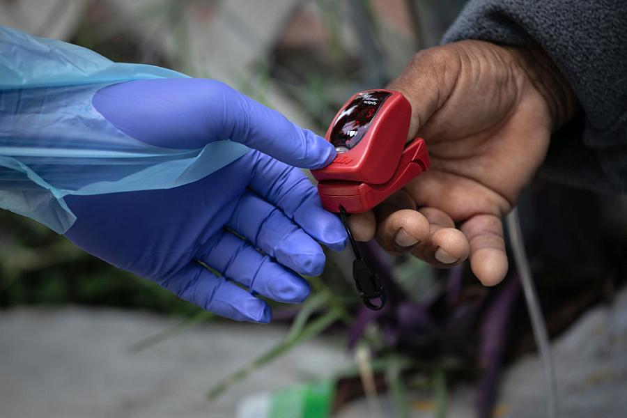 Image of a person checking their blood oxygen level