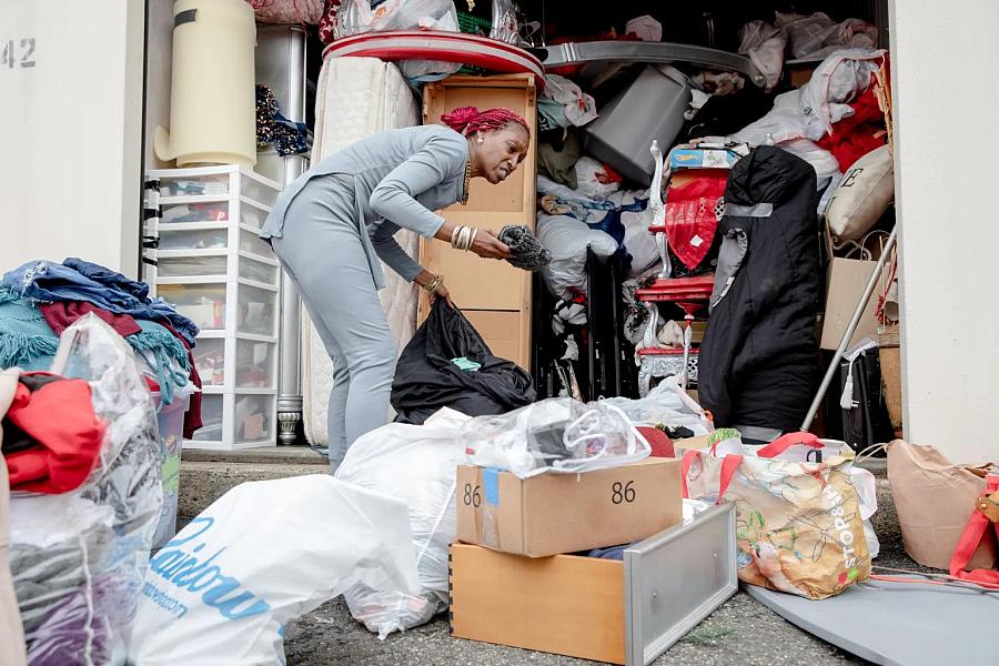 A woman taking her packing due to eviction