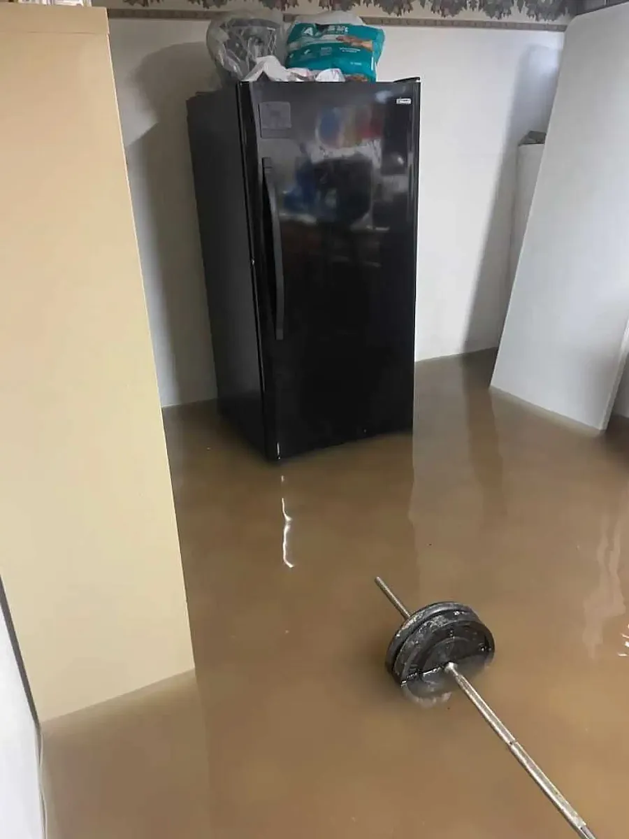 A barbell weight in a hall