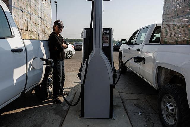 Image of a person at gas station