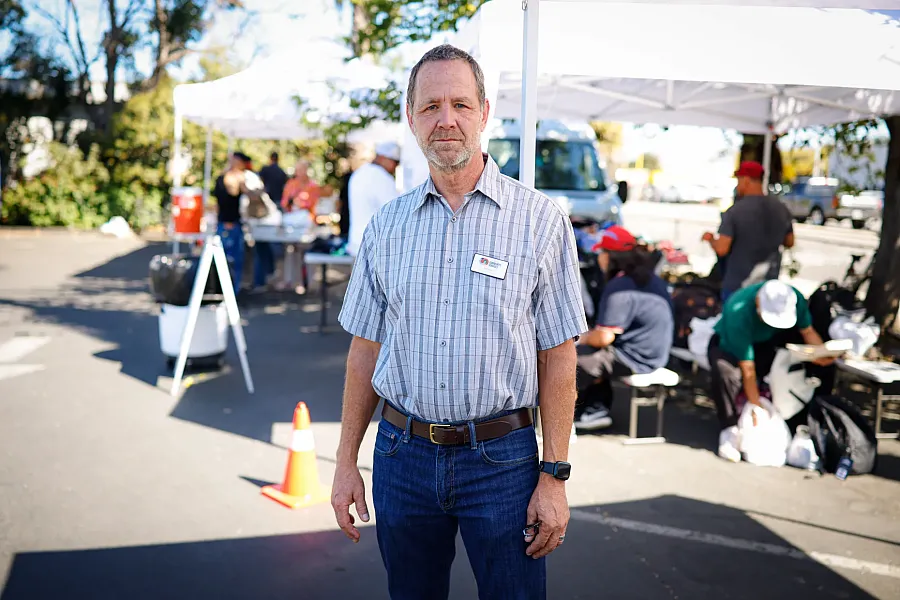 A person standing in a tent