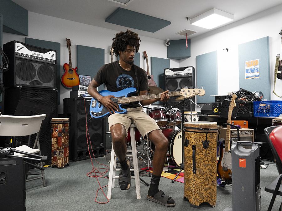 Person playing guitar