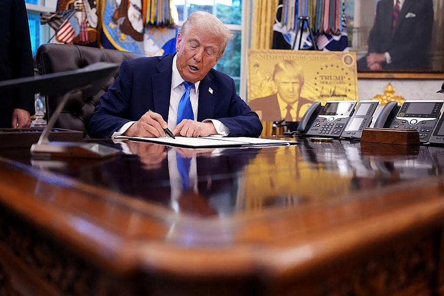 Person signing a document in office