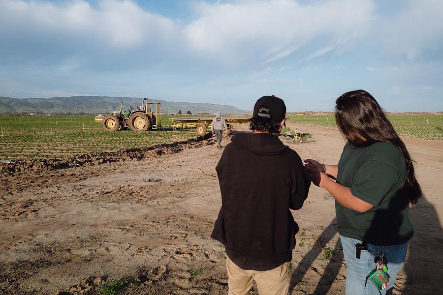 Two people at a farm