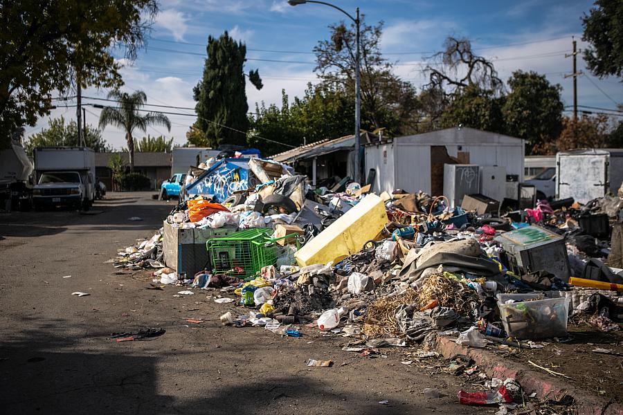 Image of Garbage piles at Stockton Park Village