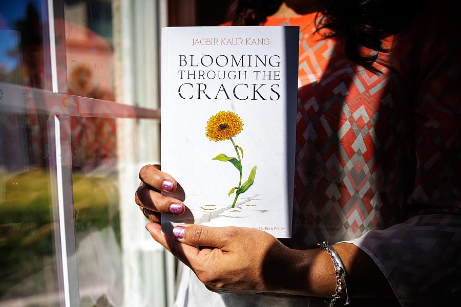 Person showing a book