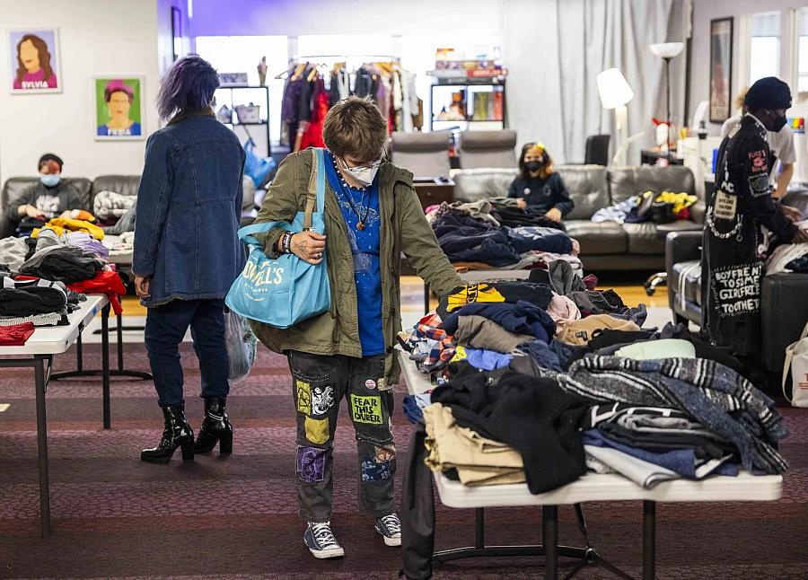 Image of a person looking at clothes