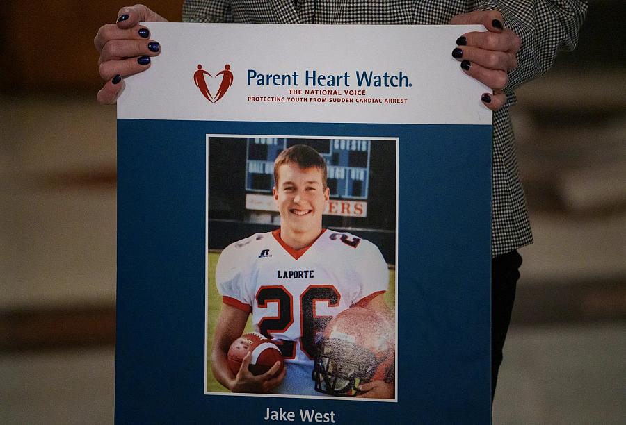 A poster of a college football player with title Parent Heart Watch