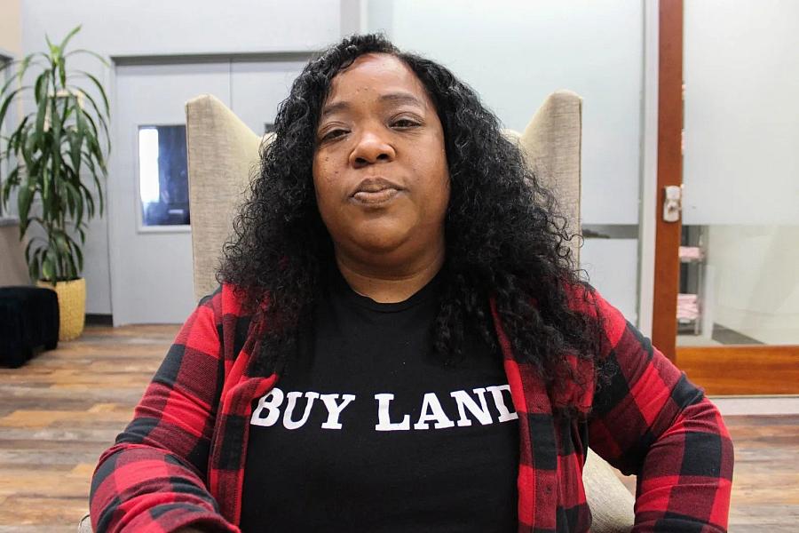 Laila Aziz poses for a photo inside Pillars of the Community in Southeastern San Diego on Feb. 14, 2023. Aziz filed a complaint on behalf of Abraham Jarvis who says he has been racially profiled by San Diego police officers. (Anissa Durham/Word In Black)