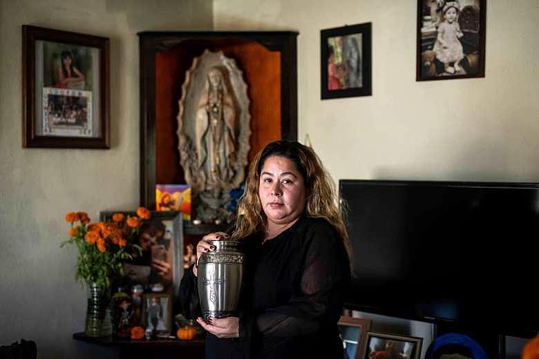 Image of a person holding ashes