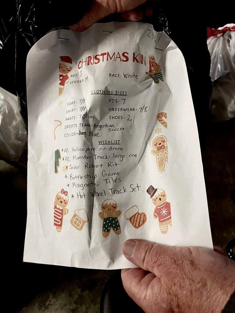 Christmas wish list form for a child, decorated with holiday-themed illustrations.