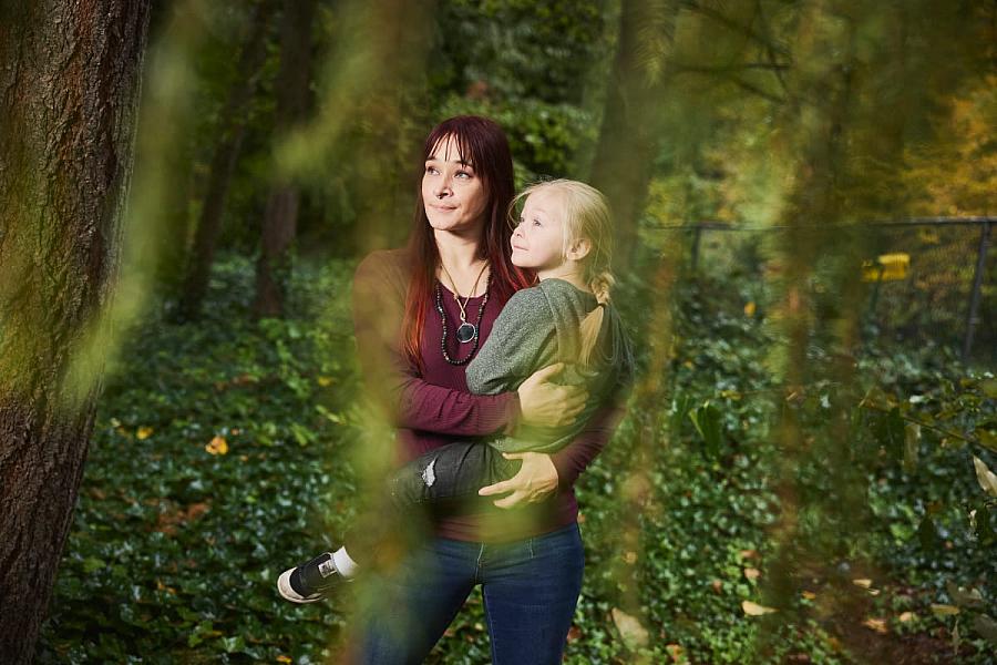 A person holding a child