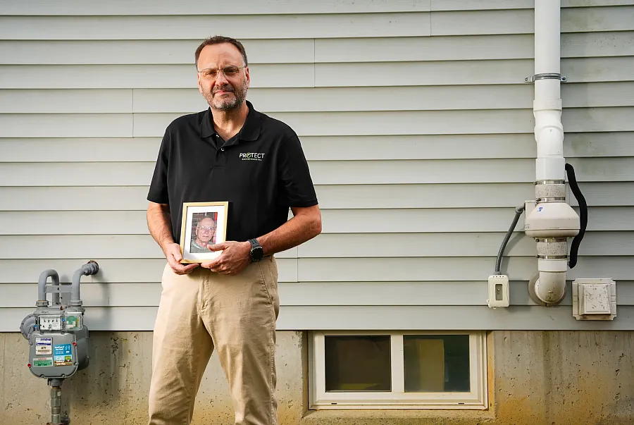 A person holding a picture
