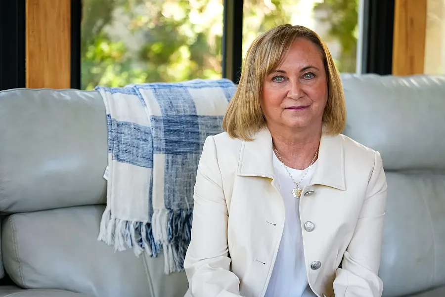 A person sitting on a sofa