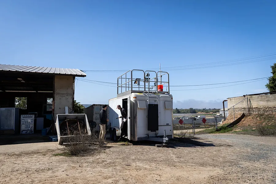 A large non-movable trailer in an open space