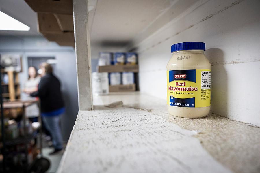 A shelf with a bottle
