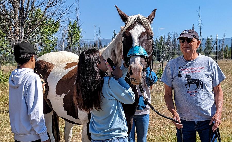 Image of people with horse