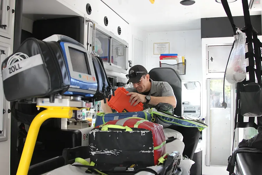 A paramedic in an ambulance