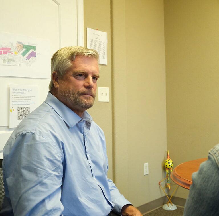 A person in a blue shirt