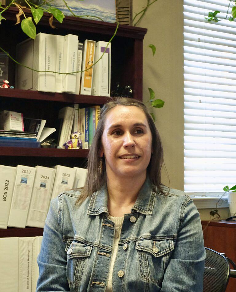 A person in a denim jacket