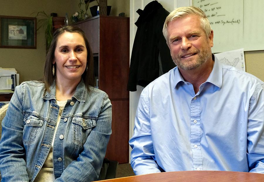 Two people sitting together