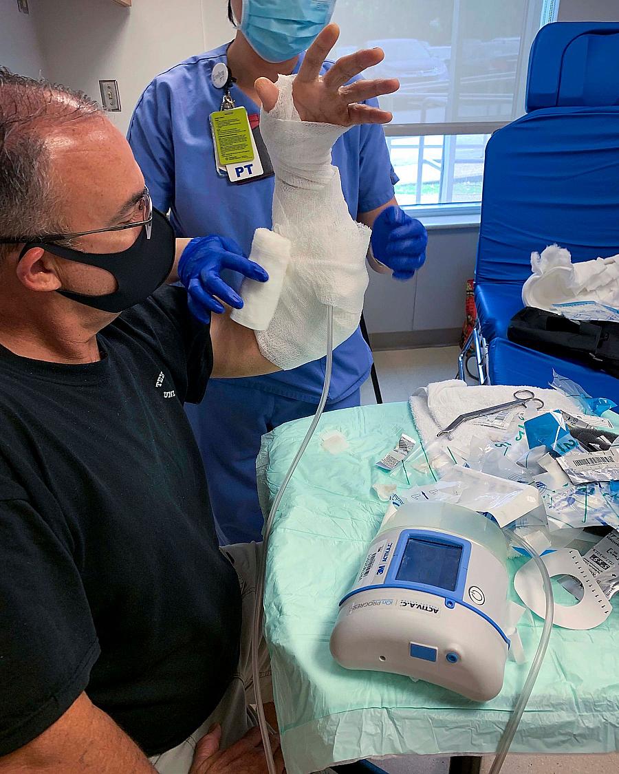 Image of a person with plaster on their hand