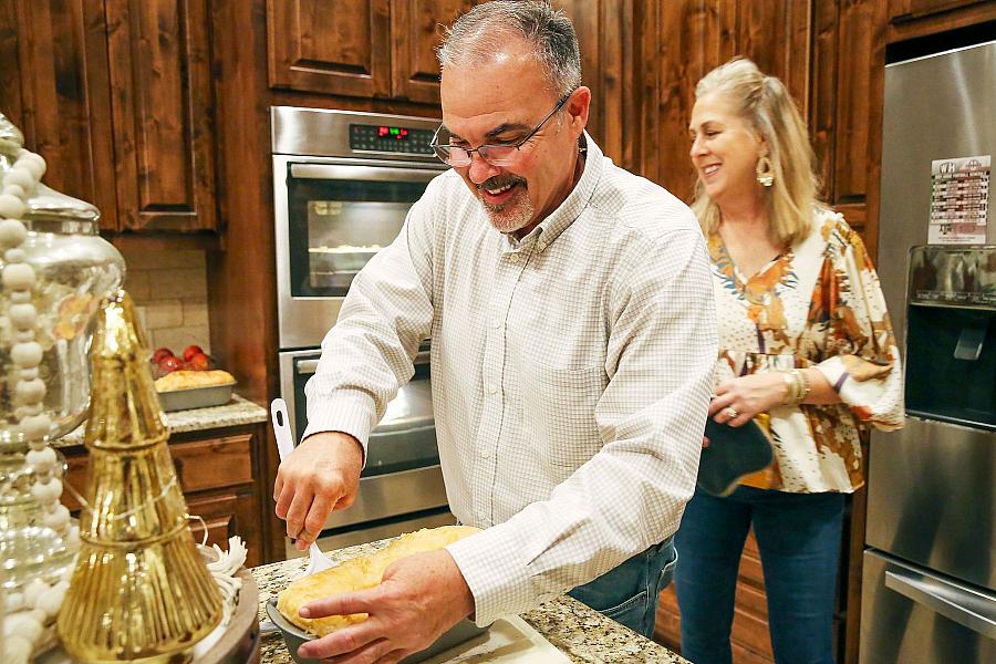 Image of two people in kitchen