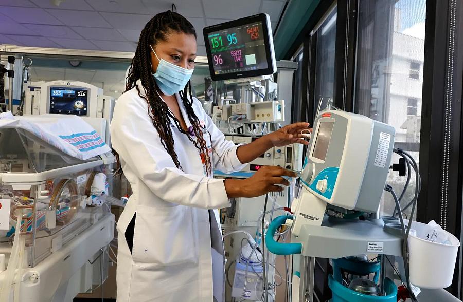 Image of a doctor looking at the monitor