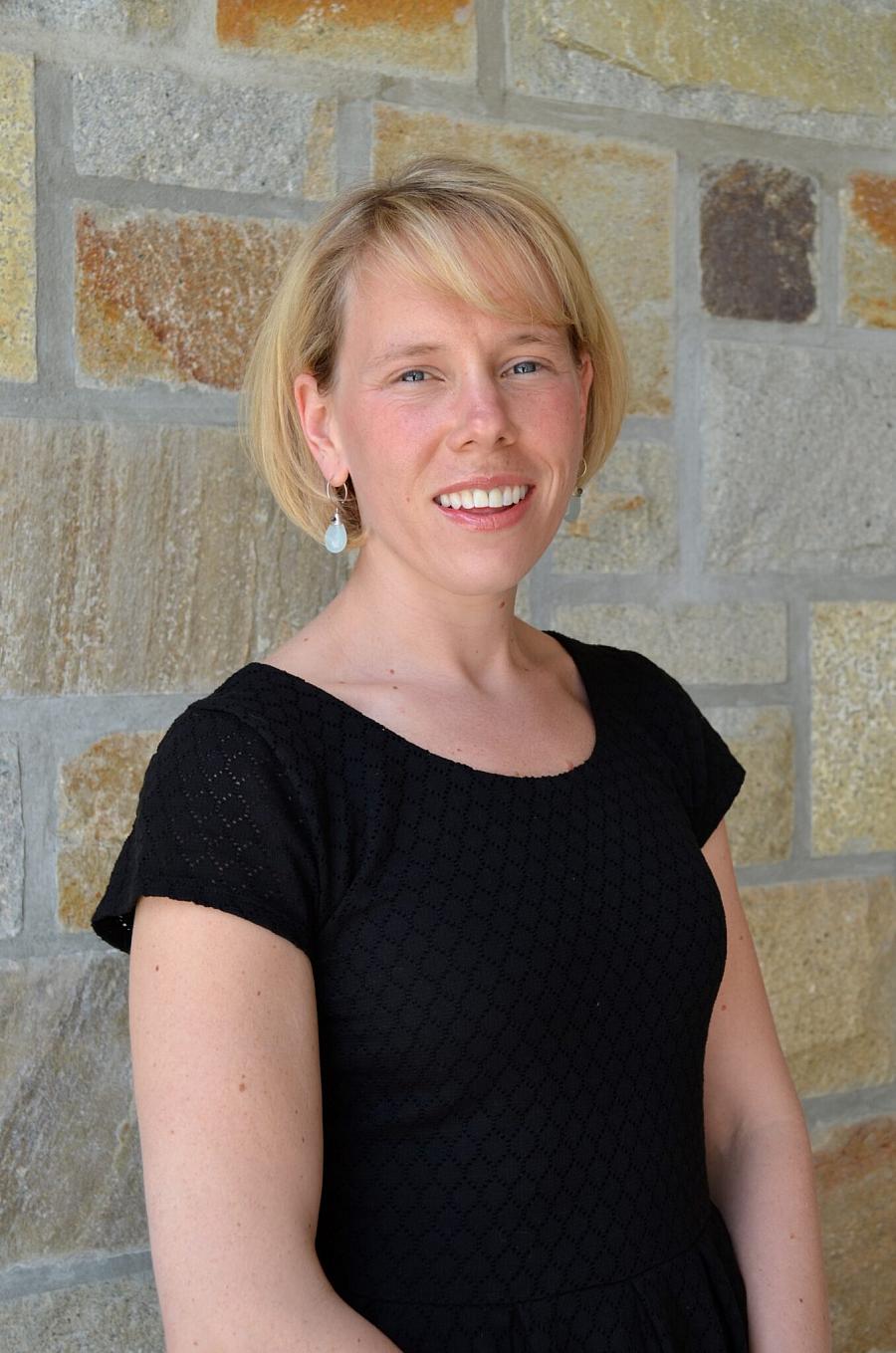 A person in a black top