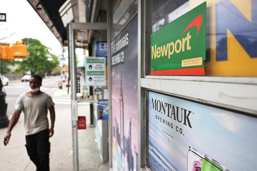 Image of a person walking out of store