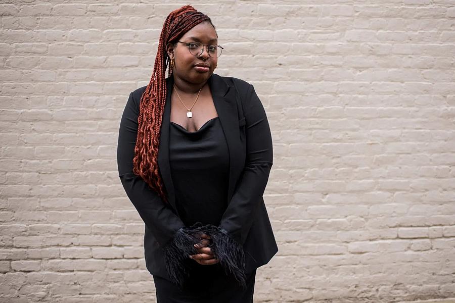 Tamica Jean-Charles, 24, poses for portraits at the Downtown Mall in Charlottesville, Virginia, on March 1, 2023. She was sexualized as a teenager by adult men. This contributed to her experiencing low self-esteem. (Kori Price/Word In Black)