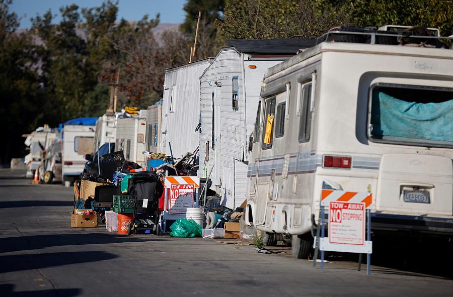 A trail of RVs parked