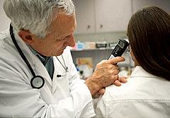 Doctor examining patient