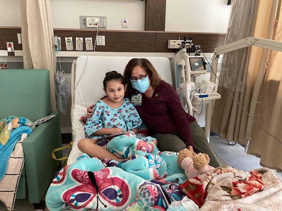 Brianna, 8, with author Dr. ChrisAnna Mink, during her January stay at Harbor-UCLA Medical Center, where she was treated for a C