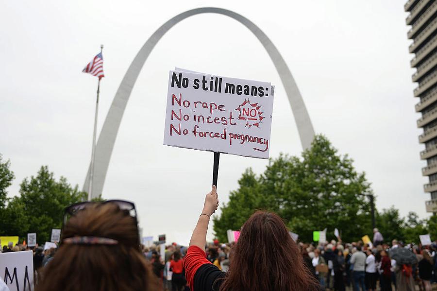 A demonstrator displays a sign during a protest rally over recent restrictive abortion laws on May 21 in St Louis, Missouri. (Ph