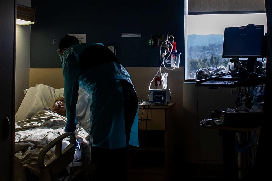 A patient rests in a hospital bed. (Getty Images)