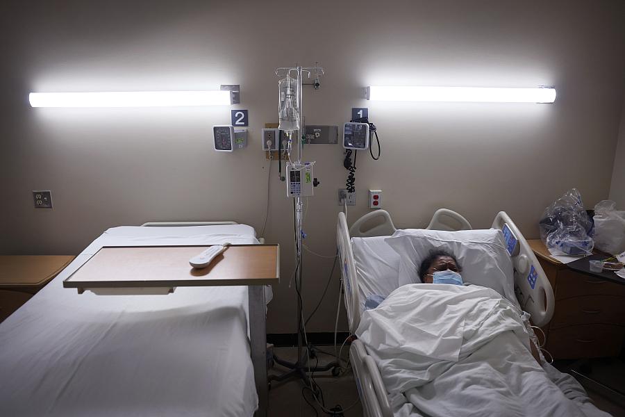 Getty Images: Patient lying in hospital bed.