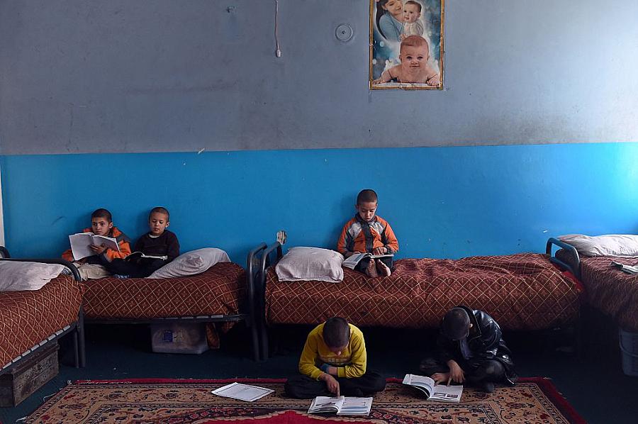 Children shown in an orphanage. (Photo by Wakil Kohsar/AFP via Getty Images)   