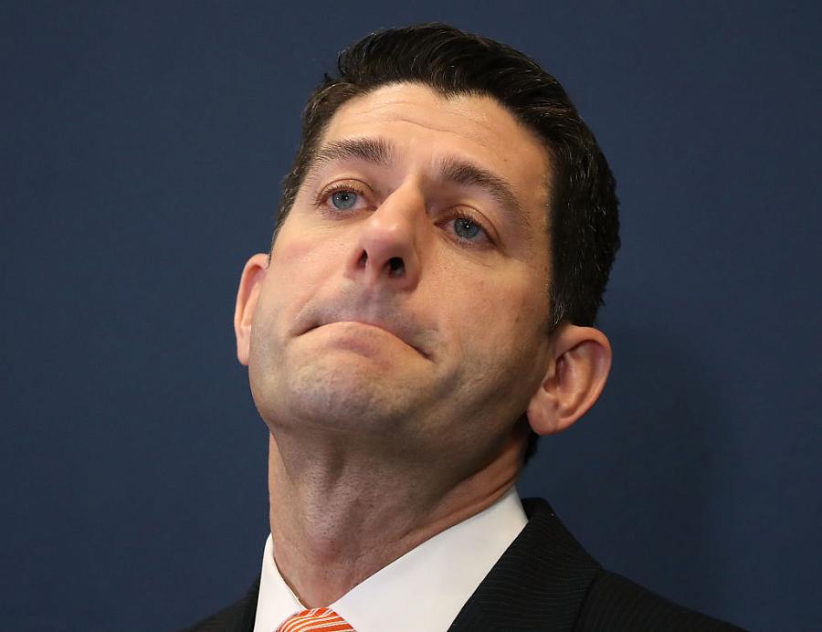 Speaker of the House Paul Ryan looking embarrassed 