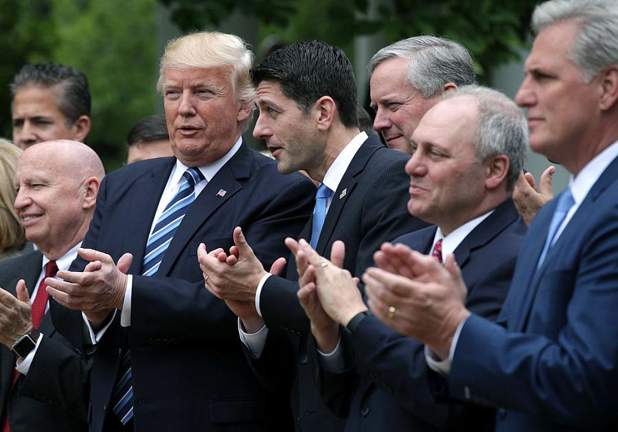 Trump and Paul Ryan applaud 